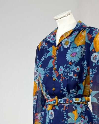Vestido años 70 azul con estampado de flores amarillas