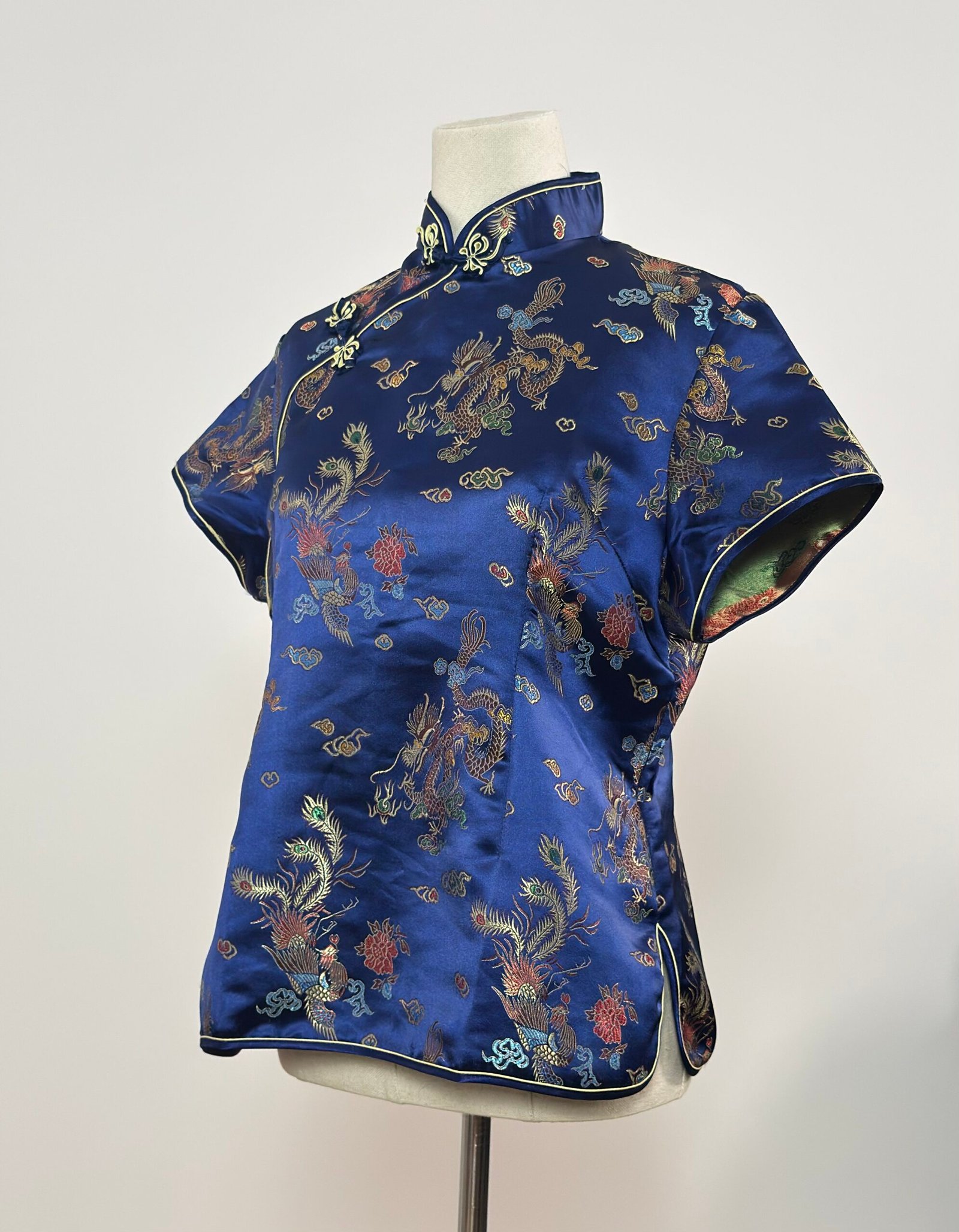 Top quipao azul eléctrico